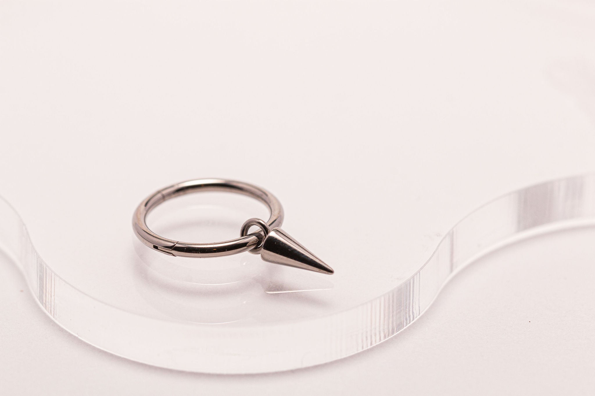 Pendant spike clicker